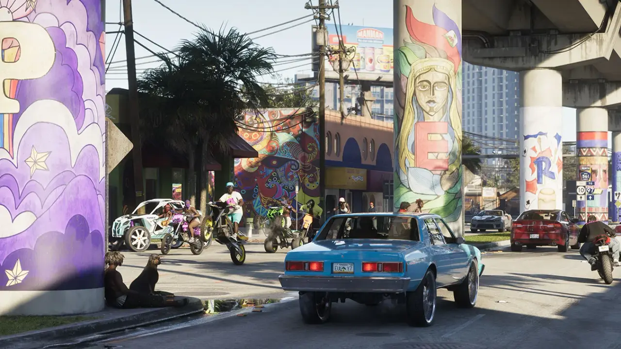 Busy Vice City street with cars, dirt bikes, and ATVs