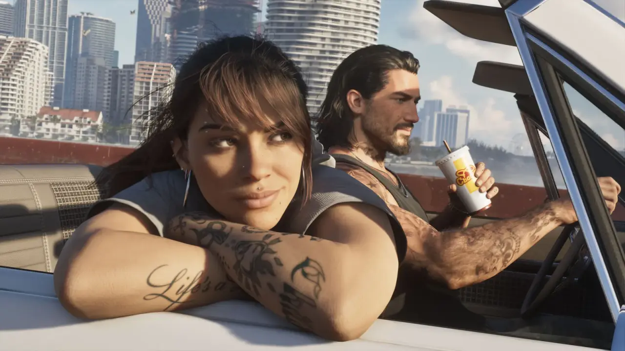 Jason and Lucia in an open-top car with Vice City buildings behind them