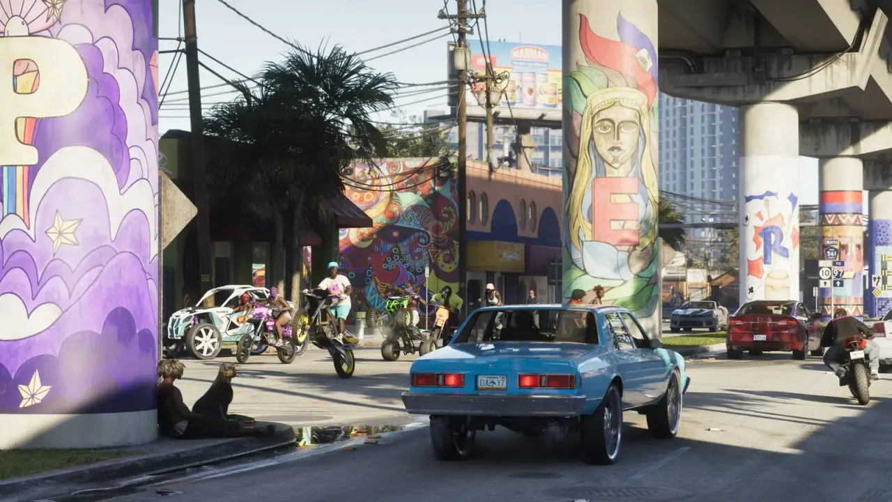 Busy Vice City street with cars, motorbikes, pedestrians, and colorful murals beneath an overpass